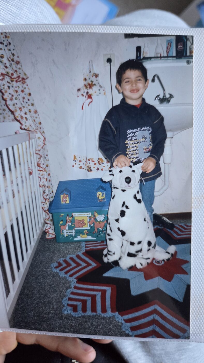 Mustafa with dalmatian stuffed animal